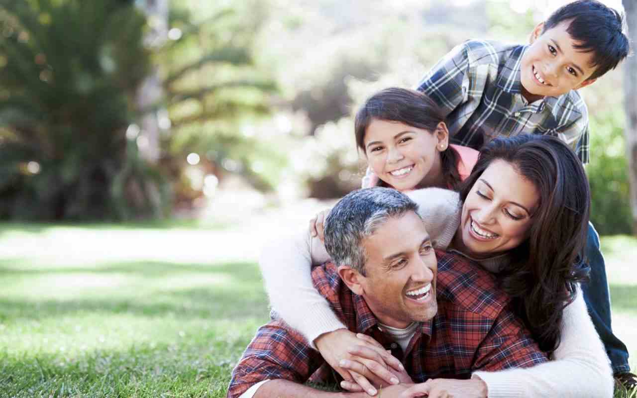 Taylor Dentist, Tx Home Banner Image 1, Family member are smiling with beautiful smile