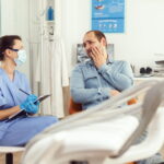 Dentist in Taylor TX examining patient for TMJ jaw pain treatment